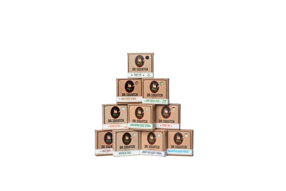 pyramid of Dr. Squatch soap bars with label facing camera on white background